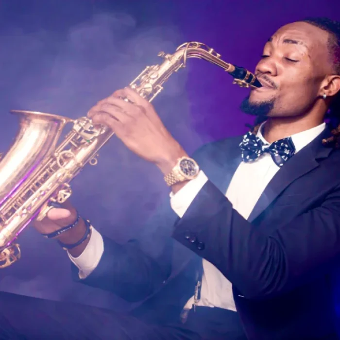 purple bg suit and sax